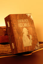 Wooden book with 'Sherlock Holmes' title and silhouette design on a yellowish background